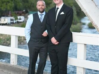 Matt & Carson standing on the bridge. 
