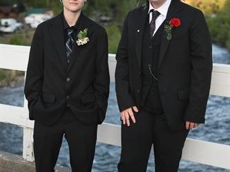 Two students standing on the bridge for a photo.